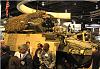 Click image for larger version

Name:	Stryker with  GD-ATP and Rafeal armor kit at AUSA08..jpg
Views:	2112
Size:	44.5 KB
ID:	9176